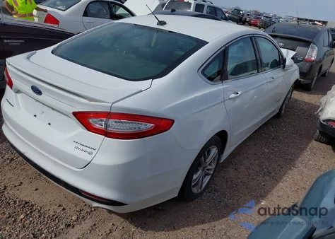 2015 Ford Fusion Hybrid Titanium from USA, damaged, VIN 3FA6P0RU2FR199059